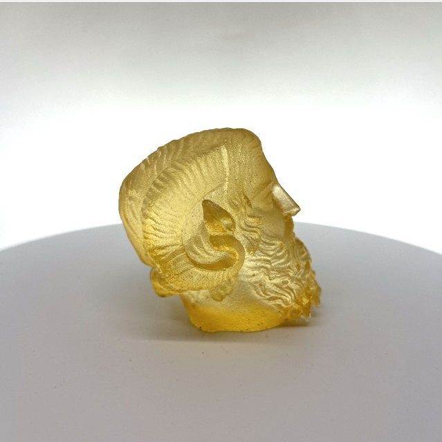 Ammon Zeus cast in resin that has ambered with age, unique piece